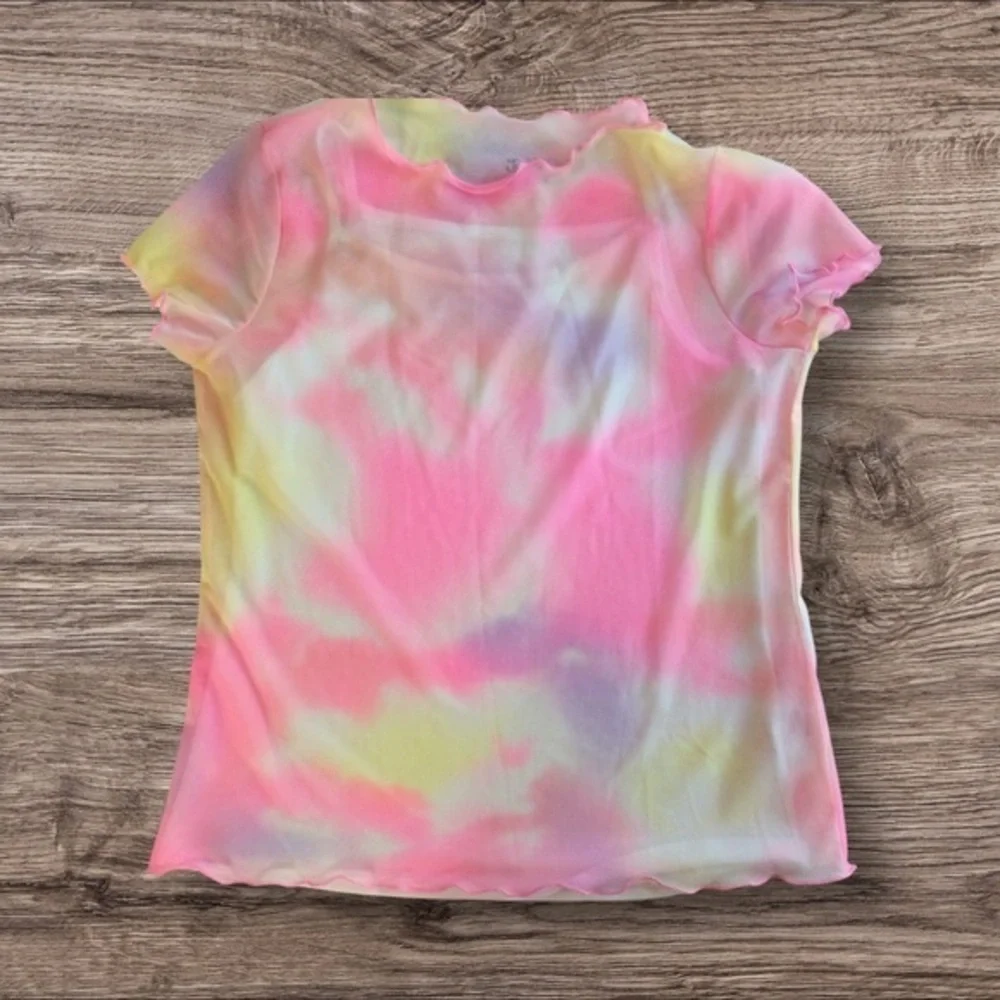 Justice tie-dye mesh shirt with built-in undershirt. XL 14–16.